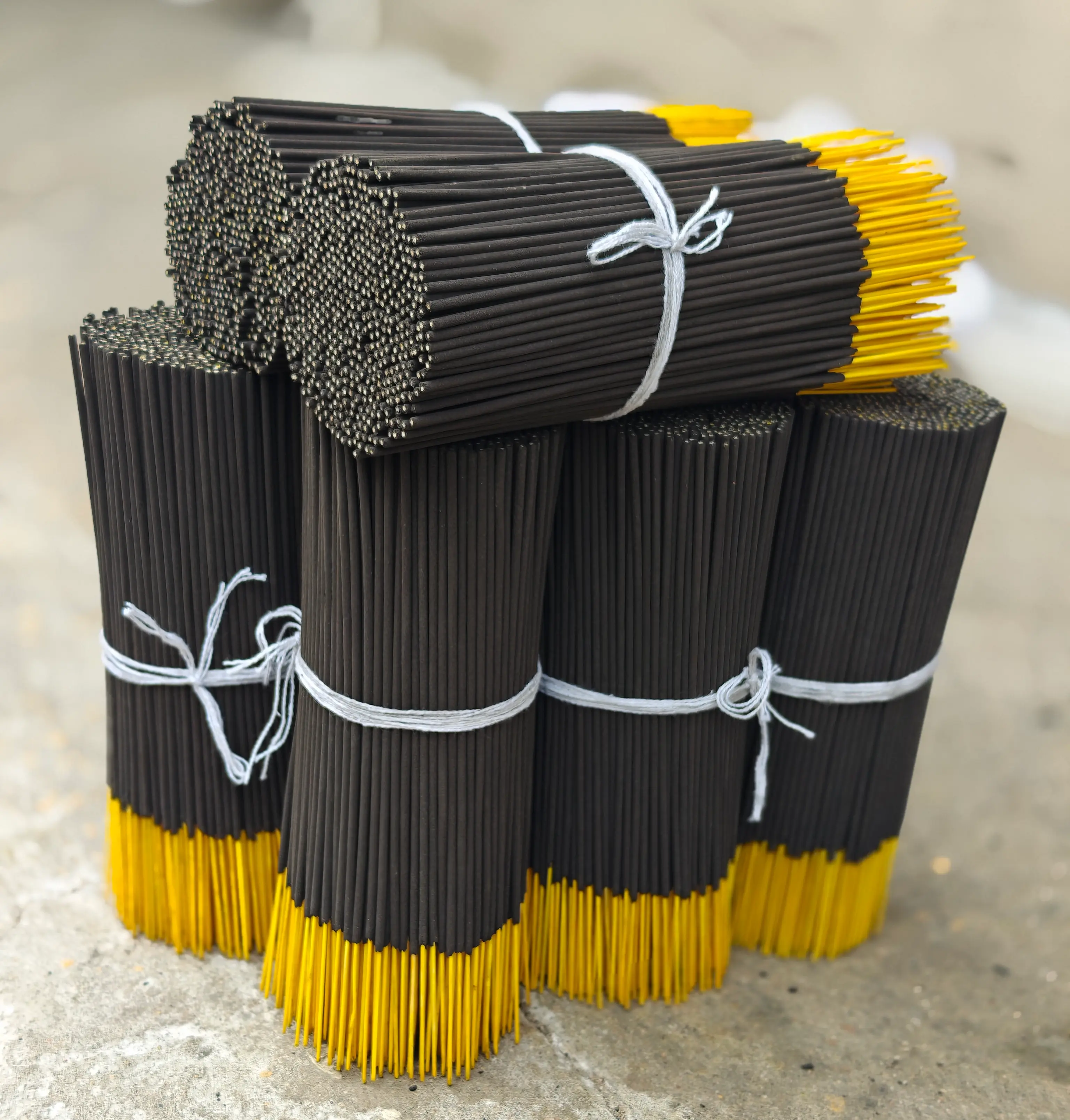 Raw agarbatti bundles stacked